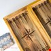  تخته نرد چوب گردو همراه با مهره، مدل نبرد مرد و شیر sh598 – اثر هنری حکاکی‌شده با چوب گردوی اصیل – خرید اینترنتی از ایران پاساژ 